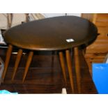 An Ercol Pebble Shaped Elm Nest Of Tables