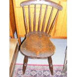 An Antique Stick Back Chair