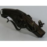 A 19thC. double barrelled wheel lock pistol