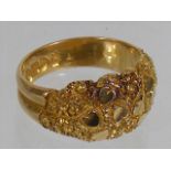 An early 20thC. 18ct gold sweethearts ring with Chester hallmark