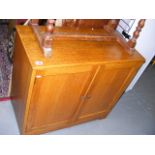 A Two Door Oak Cupboard