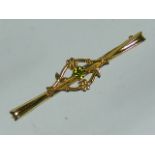 A 9ct Gold Brooch With Peridot Stone