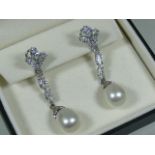 A Pair Of 18ct White Gold Pearl Ear Rings With Approx. 5.5cts Of Diamonds