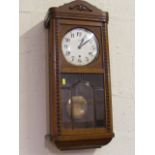 A 1920'S Oak Cased Wall Clock