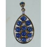 A Cabochon Sapphire & Diamond Gold Pendant