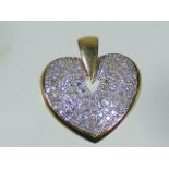 An 18ct Gold Diamond Heart Pendant