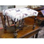 An Antique Stained Beech Reupholstered Cross Base Stool