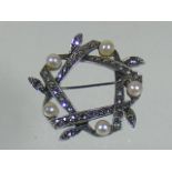 A Marcasite & Pearl Brooch