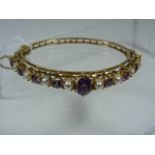A 9ct Gold Amethyst & Seed Pearl Bangle