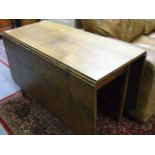 An Antique Elm Folding Leaf Table