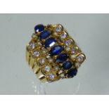 An 18ct Gold Sapphire & Diamond Ring