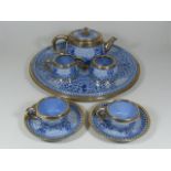 A 19thC. Silver Edged Faience Cabaret Set