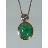 A Ladies 18ct Gold Pendant Set With Cabochon Emerald & Diamond