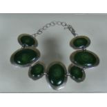 A White Metal & Jade Bracelet