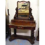 A Victorian Mahogany Dressing Table With Three Drawers
