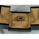 A Ladies 18ct Gold Bvlgari Snake Ring With Sapphire In Original Box
