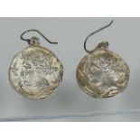 A Pair Of Silver Coin Style Ear Rings