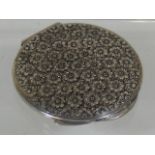 A Vintage Silver Compact With Floral Design