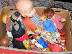 A Boxed Quantity Of Dolls