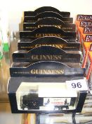 Seven Boxed Diecast Guinness Vehicles