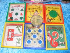 Six Vintage Hand Held Puzzles & One Earlier