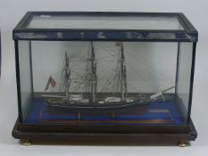 A Model Ship In Glass Display Case