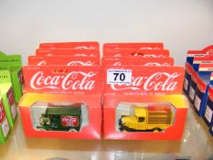 Eight Boxed Diecast Coca-Cola Vehicles