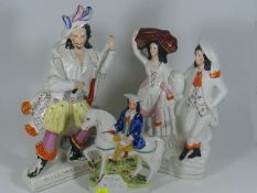 Three Staffordshire Pottery Figures, One With Faul