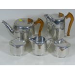 A Five Piece Picquot Ware Service