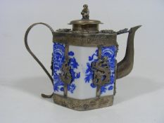 A Chinese Porcelain & White Metal Teapot