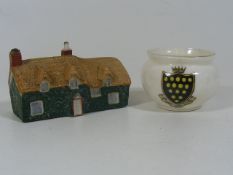 A Goss Cottage Twinned With Goss Pot With Cornish