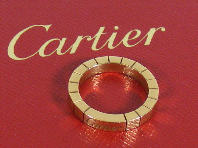 A Ladies 18ct Gold Cartier Lanieres Ring With Box