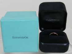 A Ladies Tiffany 18ct Gold Solitaire Diamond Ring