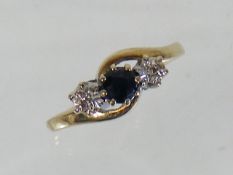 A Ladies 9ct Gold Diamond & Sapphire Ring