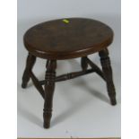 An Antique Elm Milking Stool