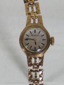 A Ladies Bulova Wristwatch With 9ct Gold Strap & C