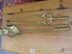 An Antique Brass Companion Set
