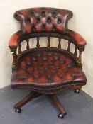 A Chesterfield Style Leather Captains Chair