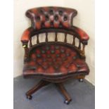 A Chesterfield Style Leather Captains Chair