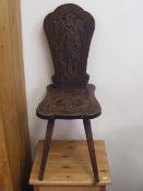 An Ethnic Styled Oak Hall Chair
