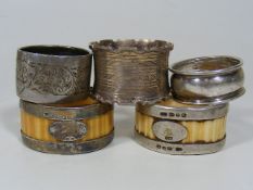 Three Silver Napkin Rings Twinned With Two Silver
