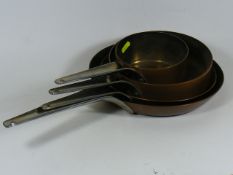 A Danish Four Piece Lined Copper Pan Set By Georg