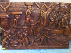An African Carved Hardwood Plaque
