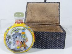An Antique Chinese Glass Scent Bottle With Silk Li
