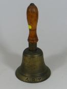 A WW2 Brass ARP Bell With Walnut Handle