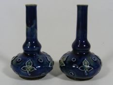 A Pair Of Doulton Vases