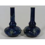 A Pair Of Doulton Vases