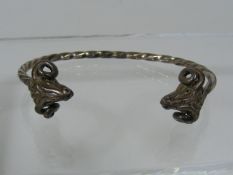 A Silver Ladies Bracelet With Rams Heads