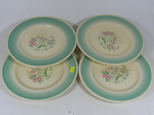 Four Susie Cooper Dinner Plates