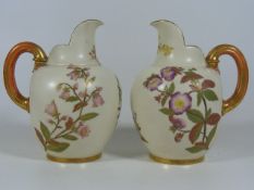 A Pair Of Royal Worcester Porcelain Jugs